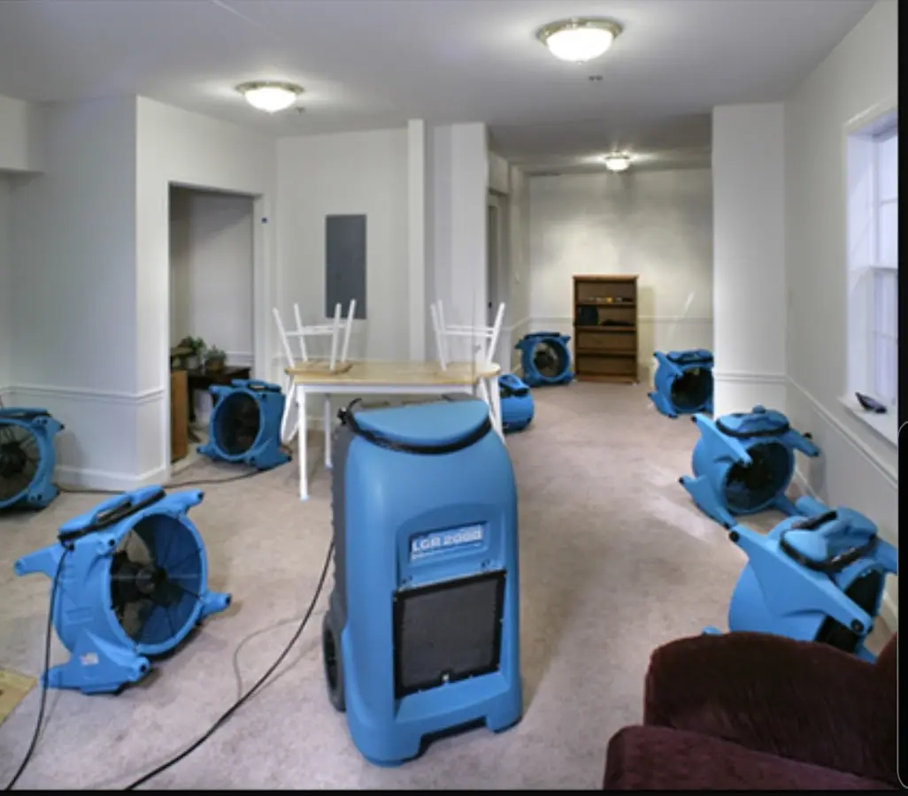 Air movers and dehumidifier setup for Water Damage Restoration in Matawan
